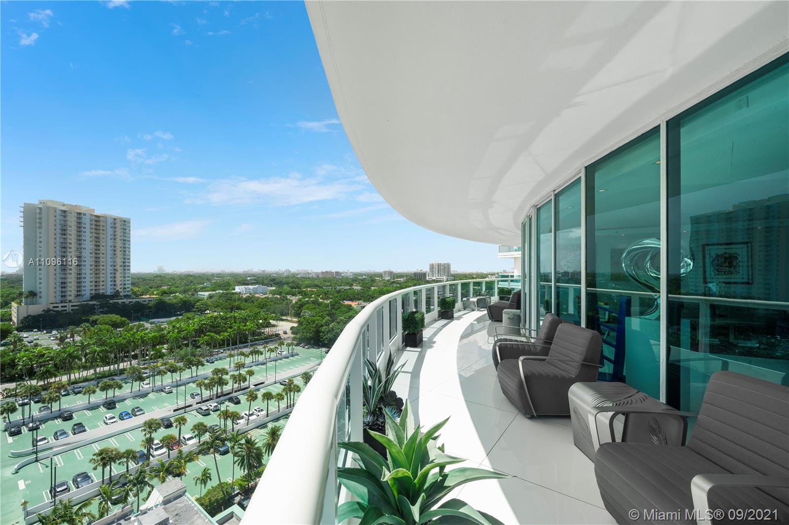 2127 Brickell Avenue, Unit 1602 Miami, FL 33129 - Photo 23 of 40 a balcony with outdoor seating and plants