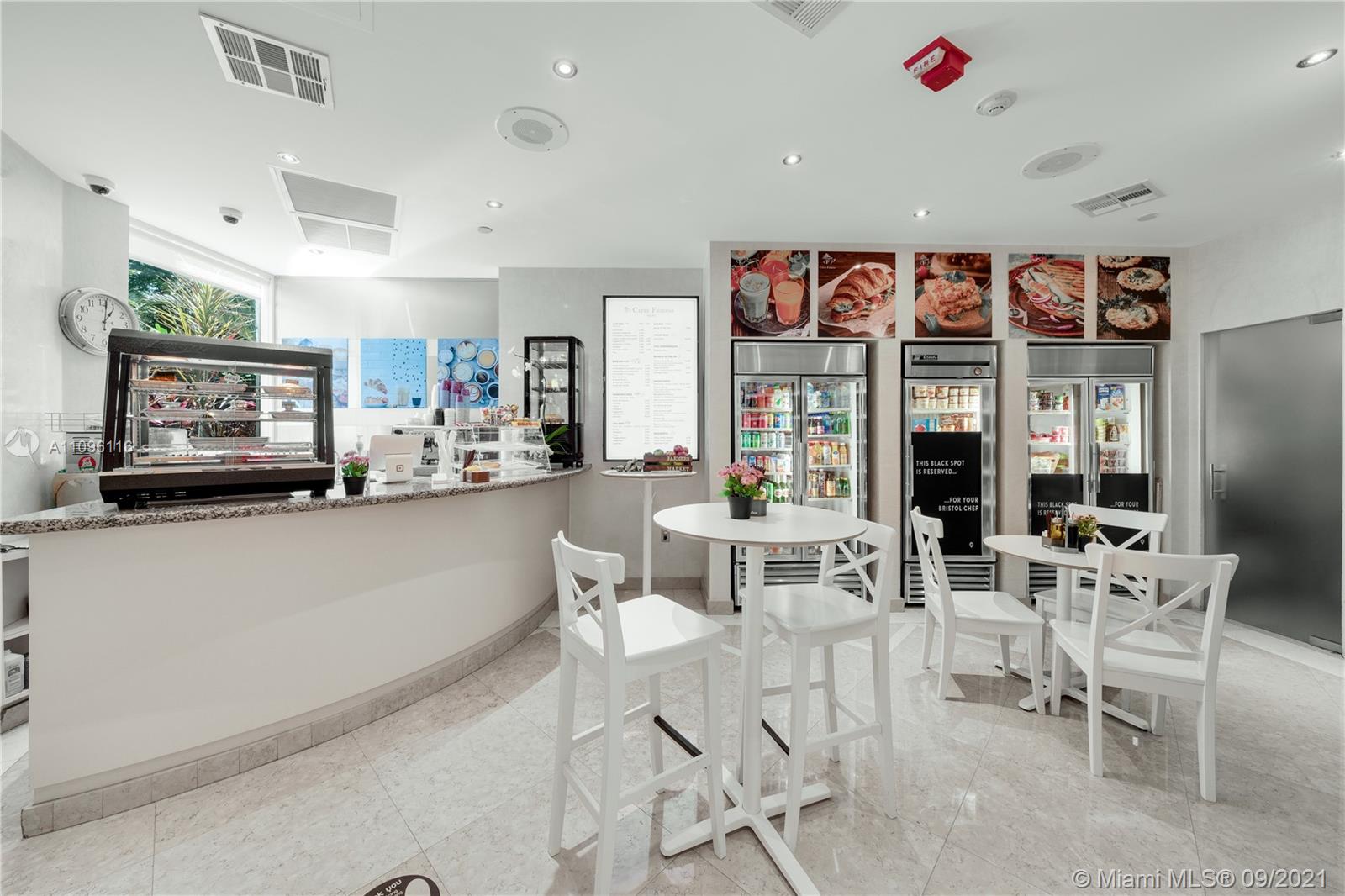 2127 Brickell Avenue, Unit 1602 Miami, FL 33129 - Photo 33 of 40 a living room with lots of furniture and a large window