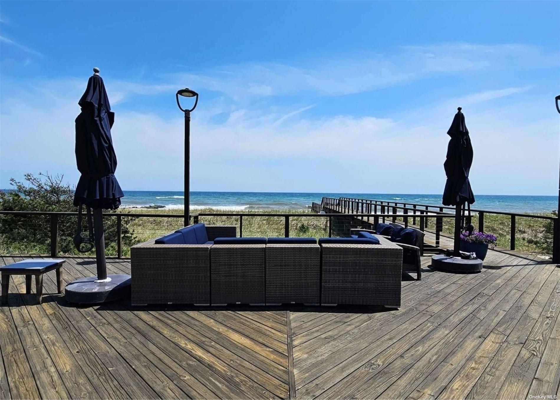 585 Dune Road, Unit L9 Westhampton, NY 11978 - Photo 12 of 20 a view of roof deck with patio