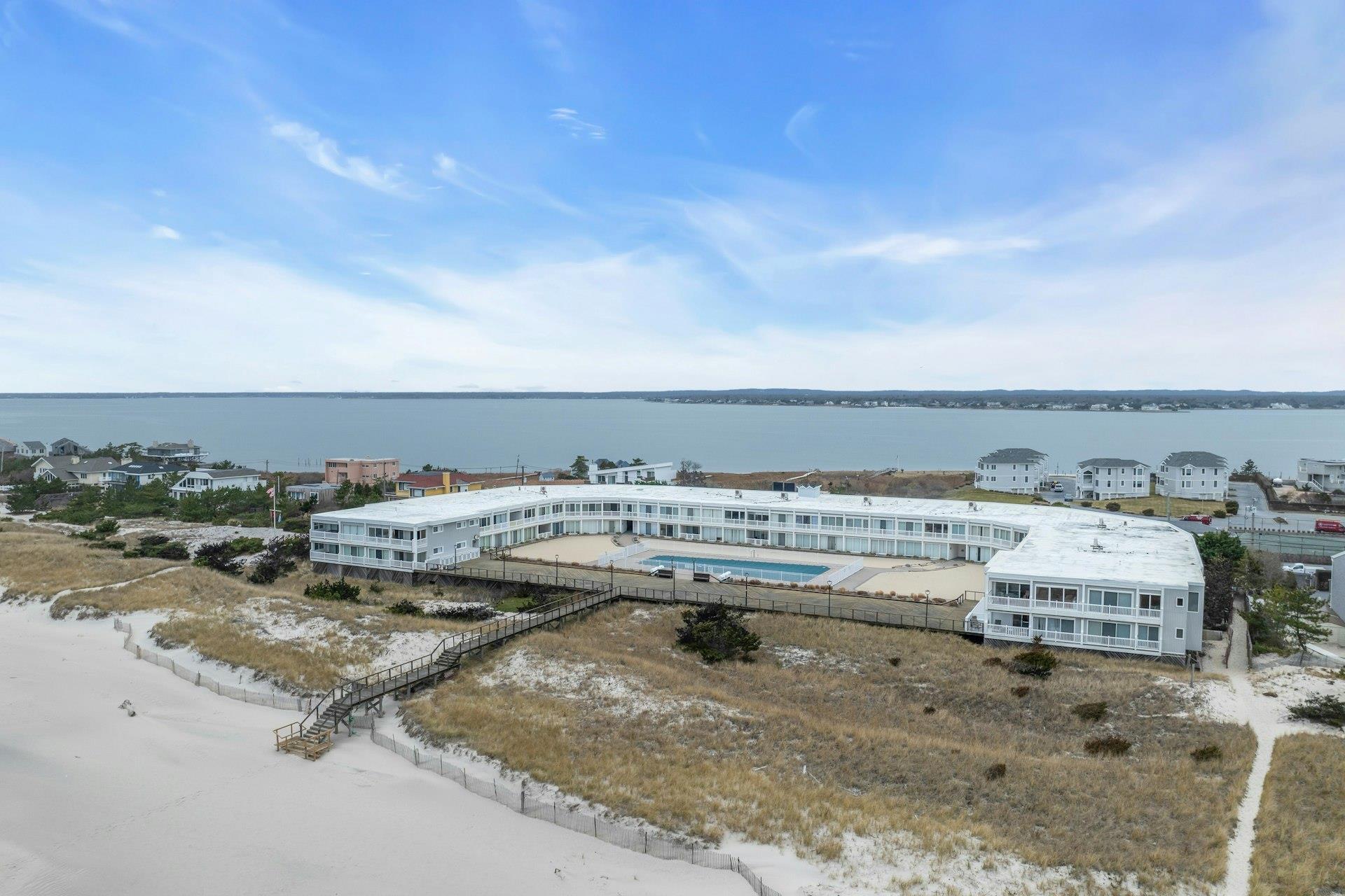 585 Dune Road, Unit L9 Westhampton, NY 11978 - Photo 16 of 20 a view of a ocean view with beach