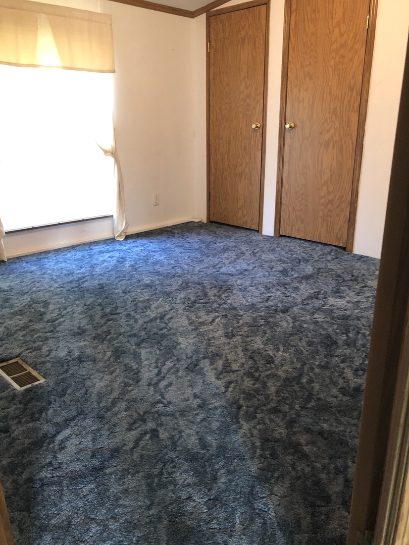 29134 North 3400 E Road Dwight, IL 60420 - Photo 11 of 27 an empty room with wooden floor