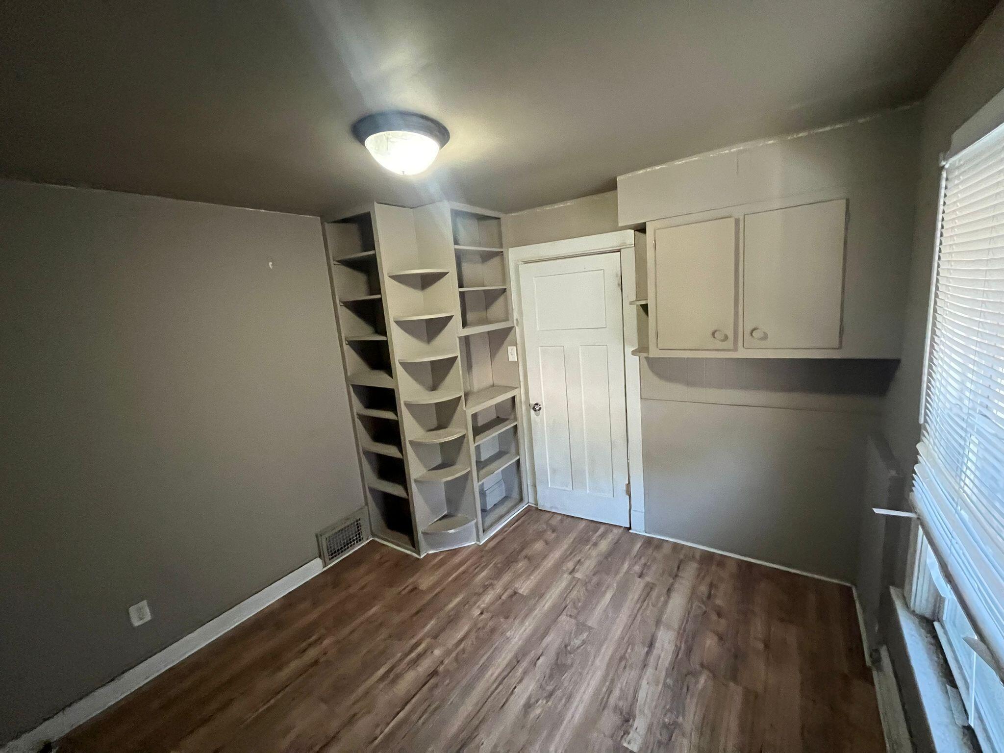 769 Buchanan Street Gary, IN 46402 - Photo 21 of 28 a view of wooden floor in an empty room