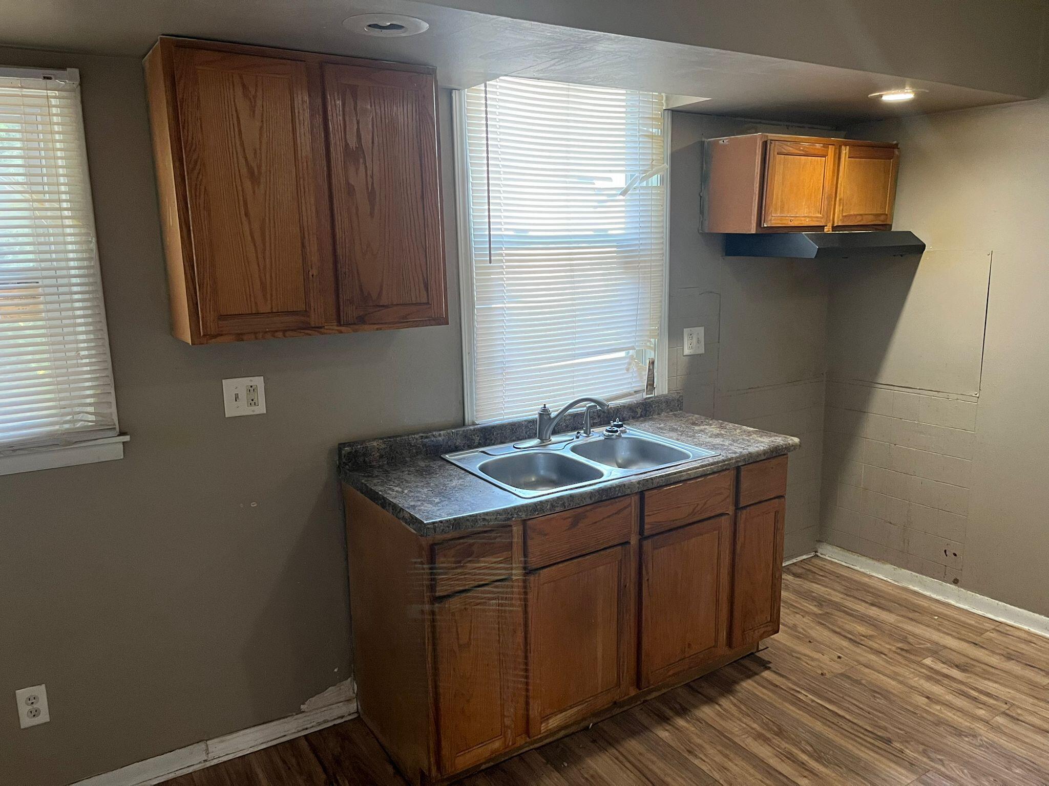 769 Buchanan Street Gary, IN 46402 - Photo 7 of 28 a bathroom with a sink and a mirror