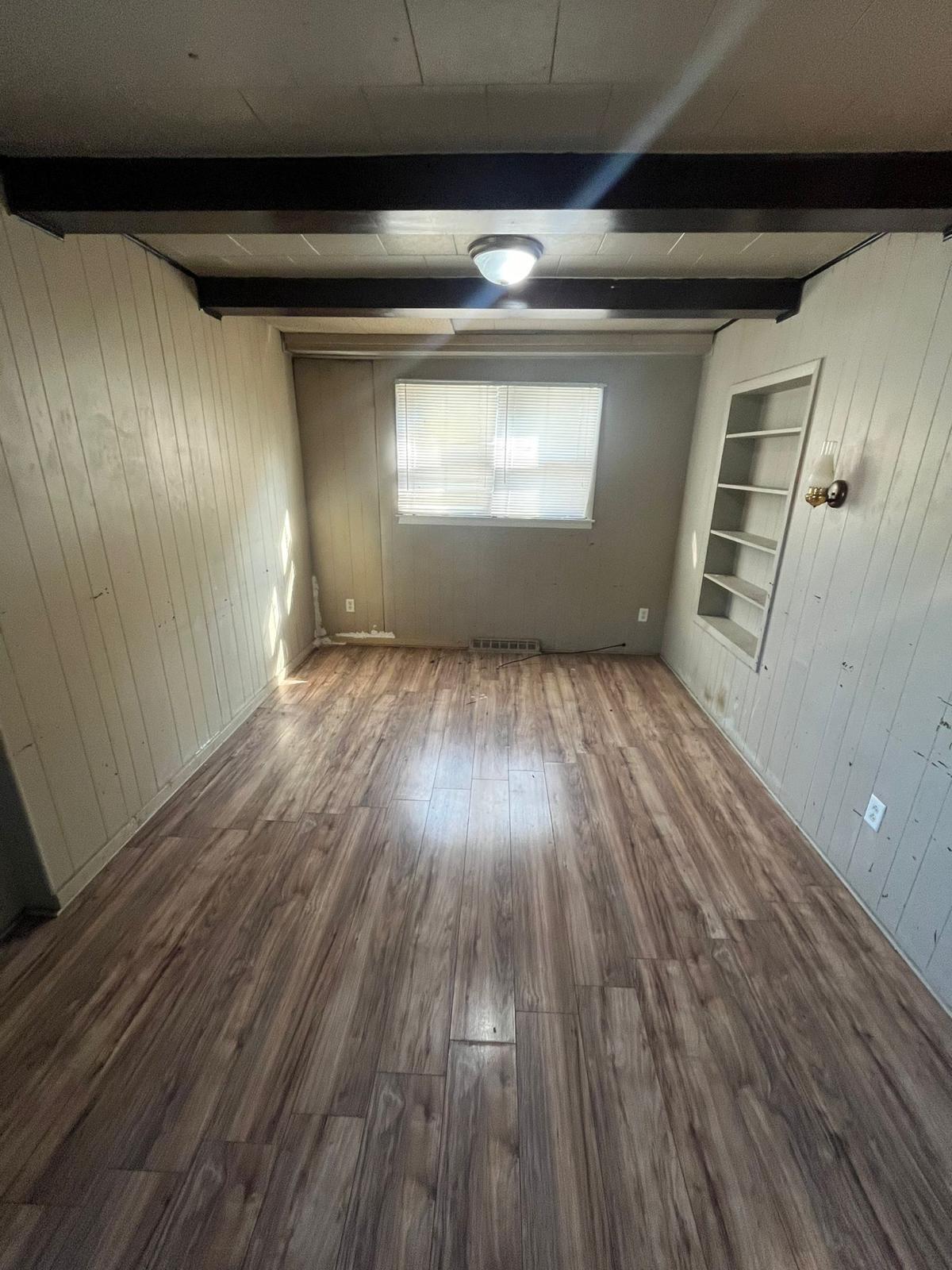 769 Buchanan Street Gary, IN 46402 - Photo 10 of 28 a view of empty room with wooden floor
