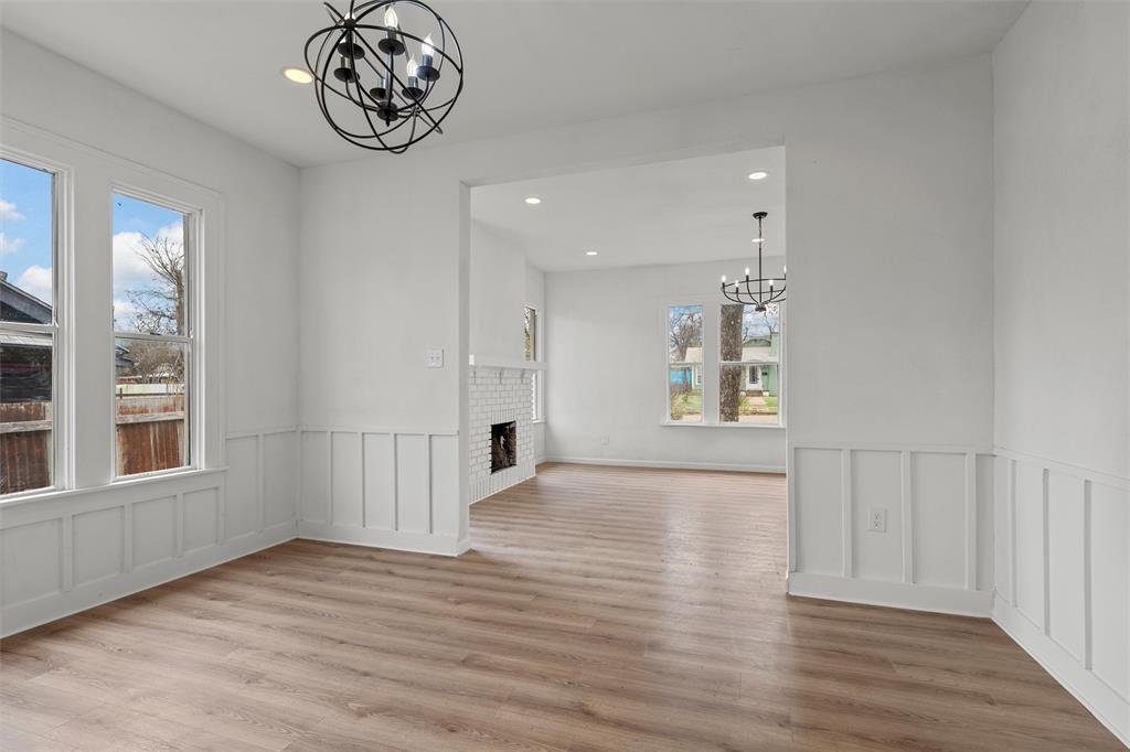1504 Proctor Avenue Waco, TX 76708 - Photo 11 of 25 wooden floor in an empty room with a window