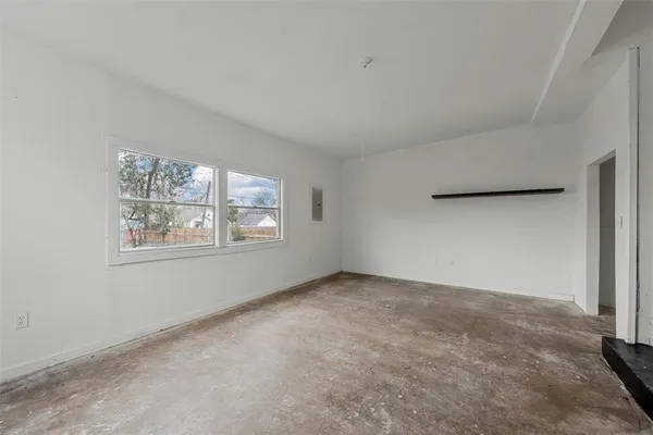 an empty room with windows