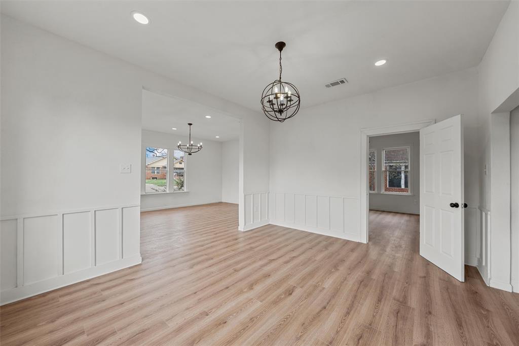 1504 Proctor Avenue Waco, TX 76708 - Photo 4 of 25 a view of empty room with wooden floor