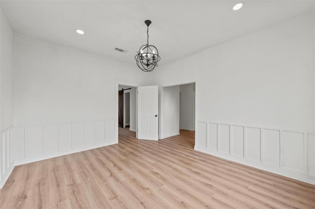 1504 Proctor Avenue Waco, TX 76708 - Photo 5 of 25 a view of a room with wooden floor