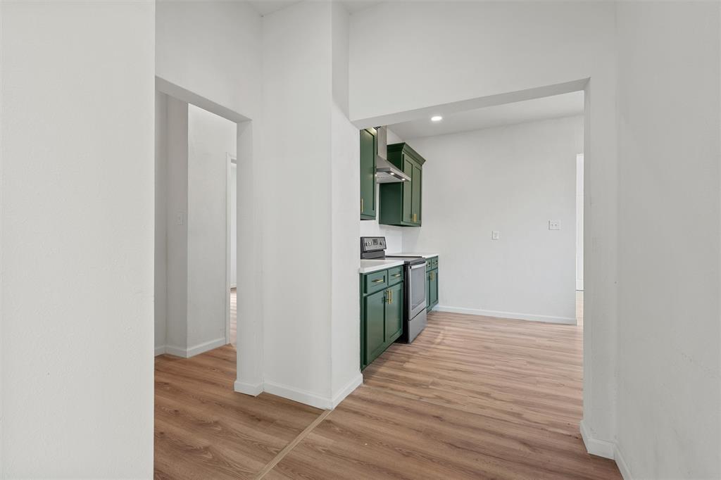 1504 Proctor Avenue Waco, TX 76708 - Photo 10 of 25 a view of a kitchen from the hallway