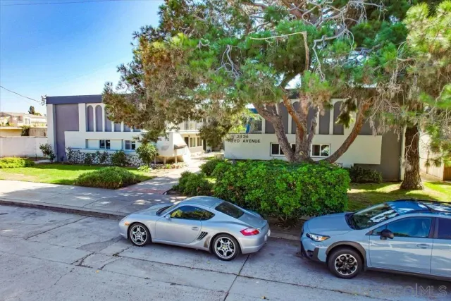 a car parked in front of a house