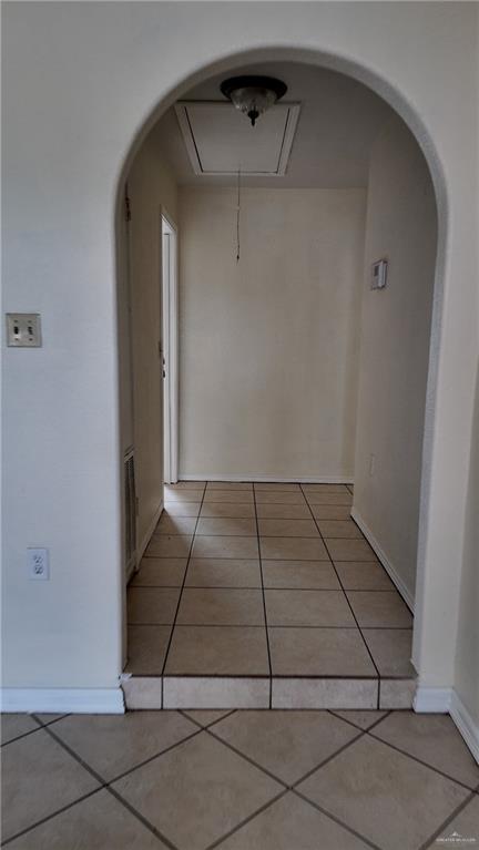 612 West Ramirez Street Rio Grande City, TX 78582 - Photo 39 of 40 Corridor with light tile patterned flooring and arched walkways