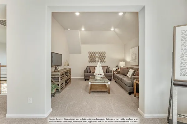 a living room with furniture and a table