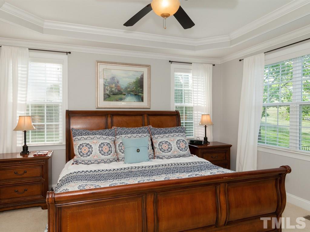 201 Challenge Road Raleigh, NC 27603 - Photo 11 of 25 a bedroom with a bed and window