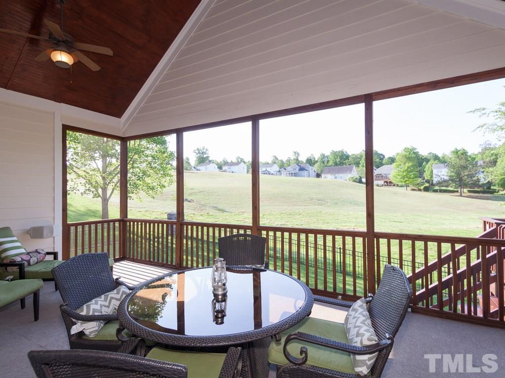 201 Challenge Road Raleigh, NC 27603 - Photo 23 of 25 a view of a dining room with furniture window and outside view