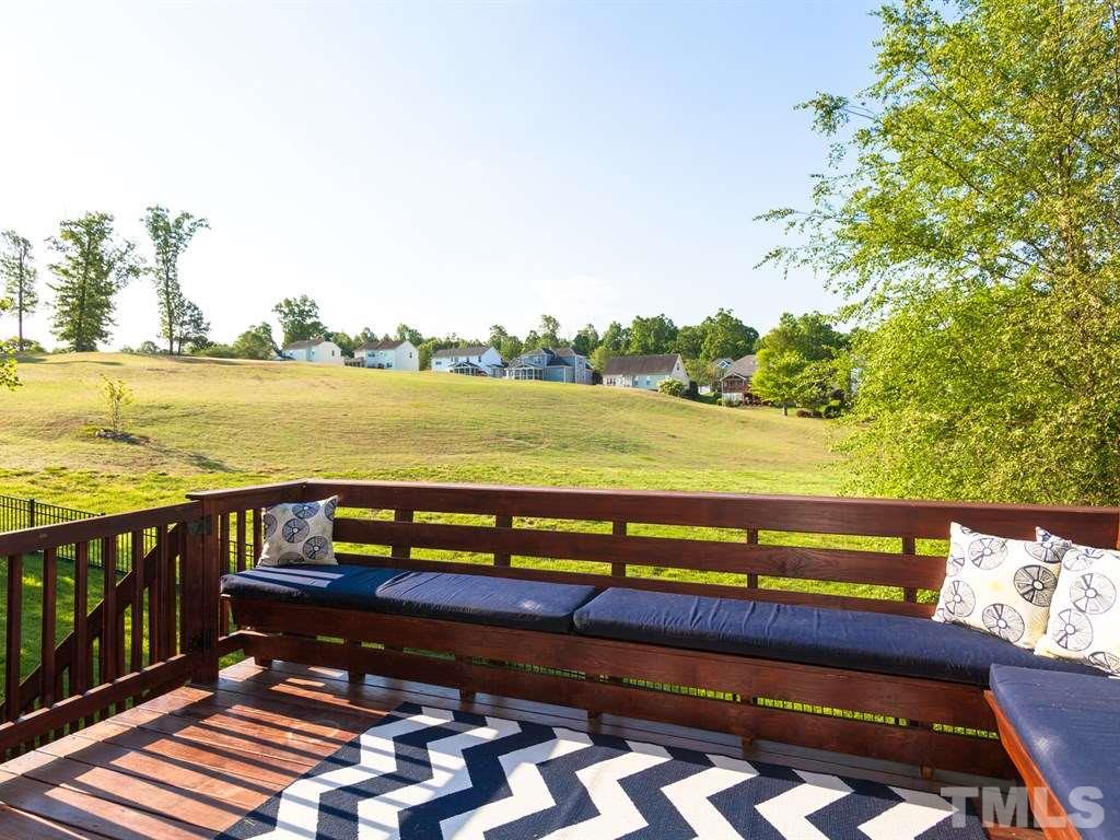 201 Challenge Road Raleigh, NC 27603 - Photo 24 of 25 a view of a terrace with outdoor seating