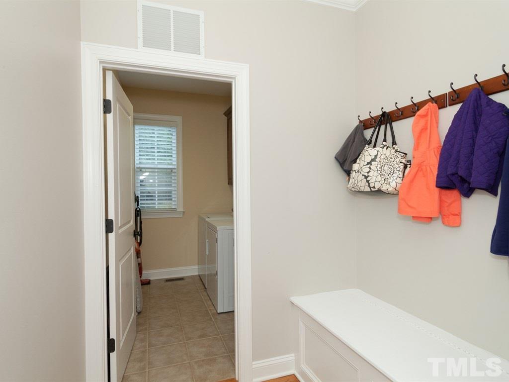 201 Challenge Road Raleigh, NC 27603 - Photo 7 of 25 a view of walk in closet with clothes