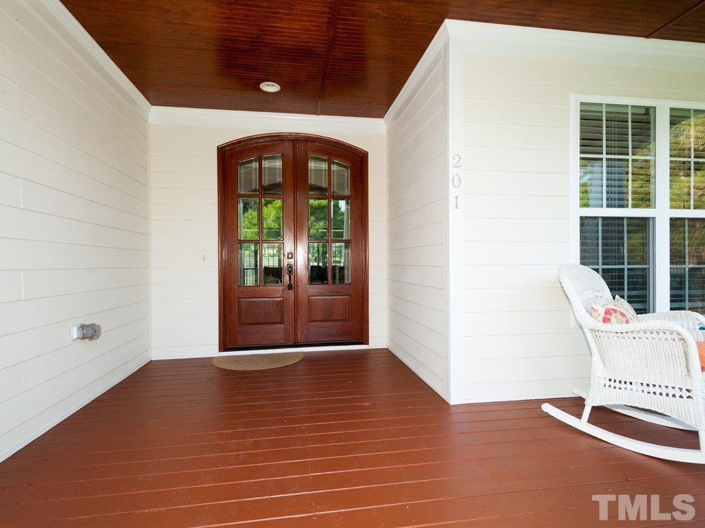 201 Challenge Road Raleigh, NC 27603 - Photo 9 of 25 a view of an entryway with a floor to ceiling window