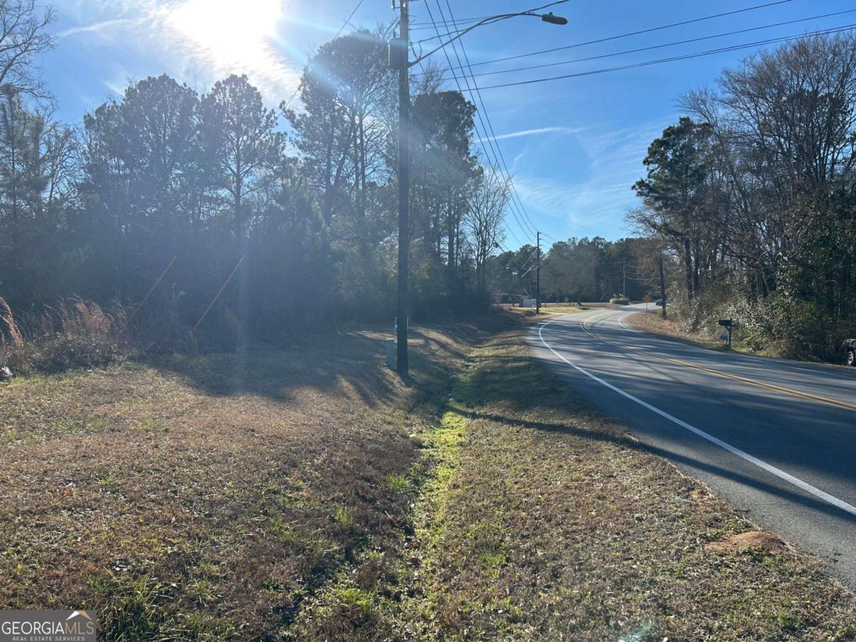 678 Dunlap Road Northeast, Unit A14 Milledgeville, GA 31061 - Photo 2 of 4 a view of a yard