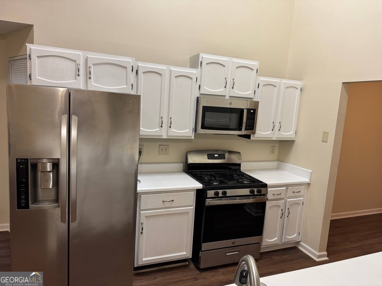 3821 Rex Mill Square Rex, GA 30273 - Photo 29 of 51 a kitchen with a refrigerator stove and microwave