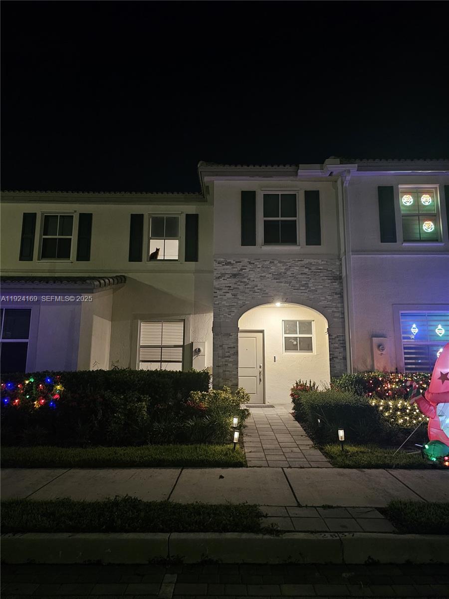 2637 Southeast 17th Street Homestead, FL 33035 - Photo 23 of 23 a front view of a house with a garden