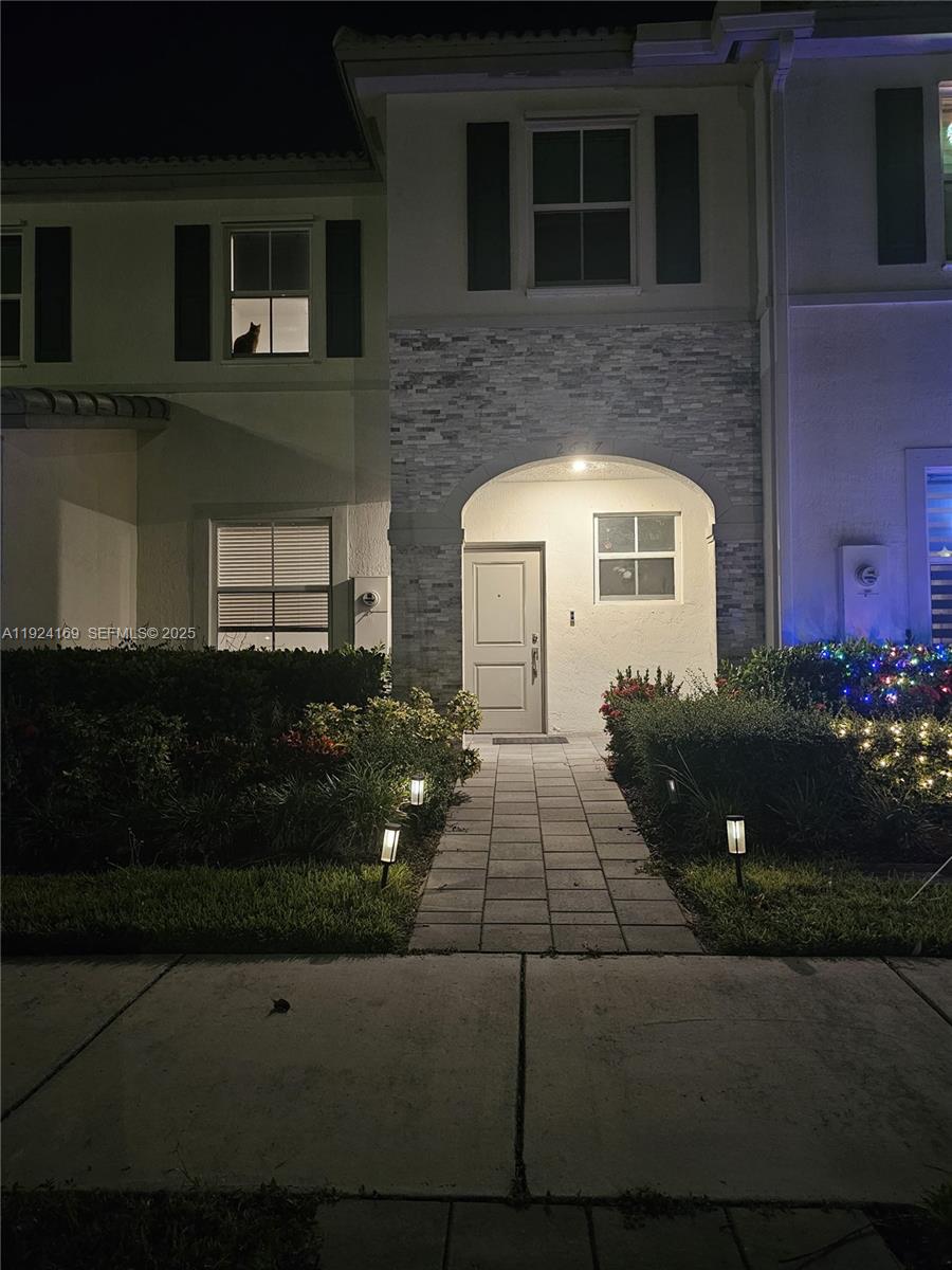 2637 Southeast 17th Street Homestead, FL 33035 - Photo 4 of 23 a front view of a house with a yard