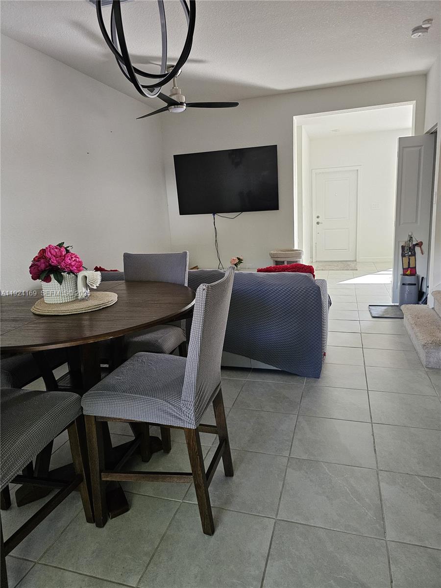 2637 Southeast 17th Street Homestead, FL 33035 - Photo 7 of 23 a dining room with furniture and wooden floor
