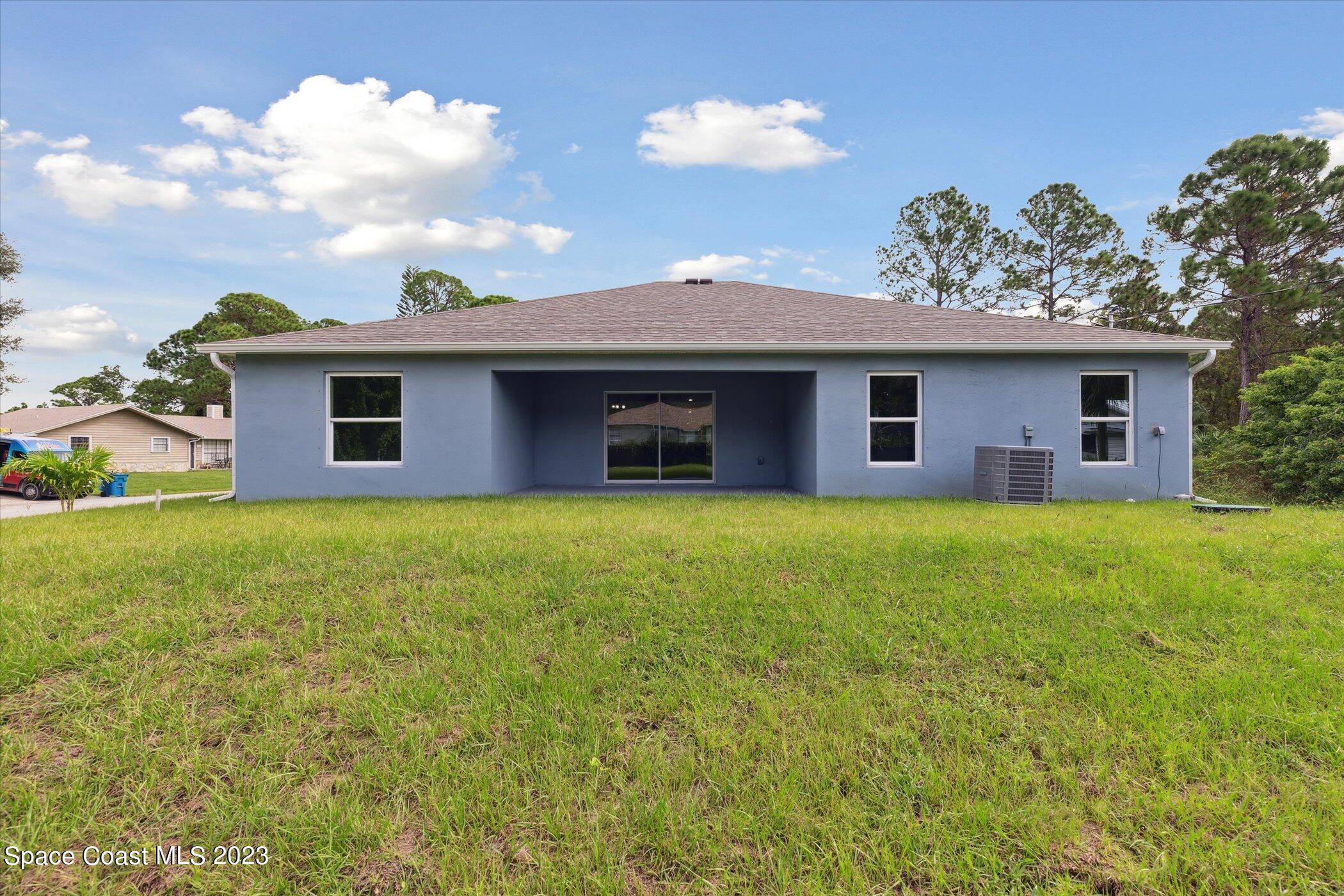 2406 Anchor Road Southeast Palm Bay, FL 32909 - Photo 32 of 37 Backyard