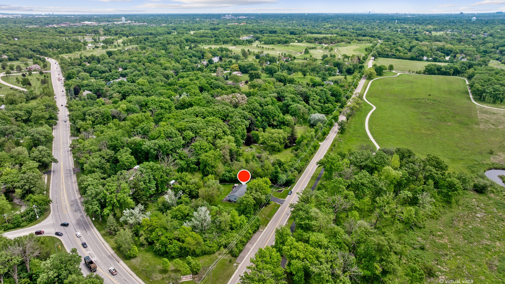 28W140 Mack Road Wheaton, IL 60189 - Photo 44 of 48 an aerial view of residential houses with outdoor space and trees