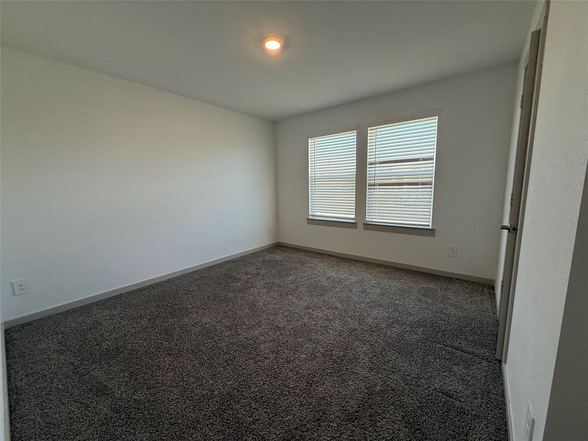30007 Reagans Rnch Drive Katy, TX 77494 - Photo 17 of 23 an empty room with a window