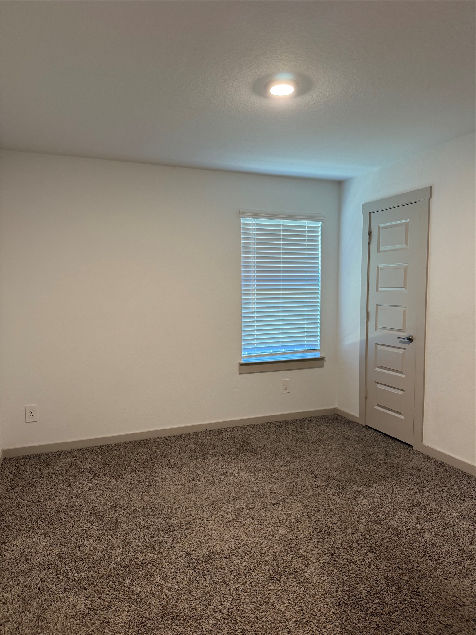 30007 Reagans Rnch Drive Katy, TX 77494 - Photo 21 of 23 an empty room with windows