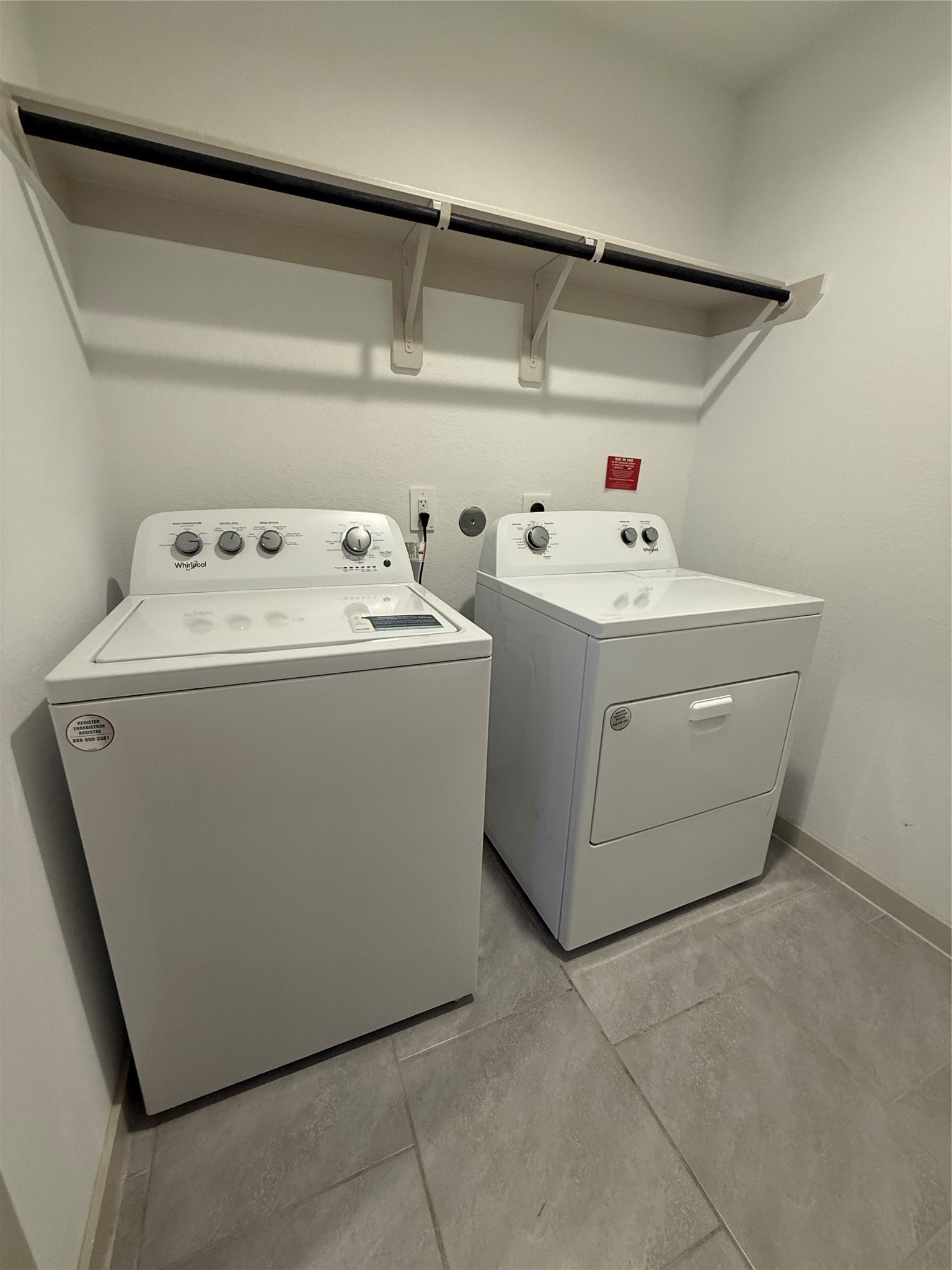 30007 Reagans Rnch Drive Katy, TX 77494 - Photo 6 of 23 a utility room with dryer and washer
