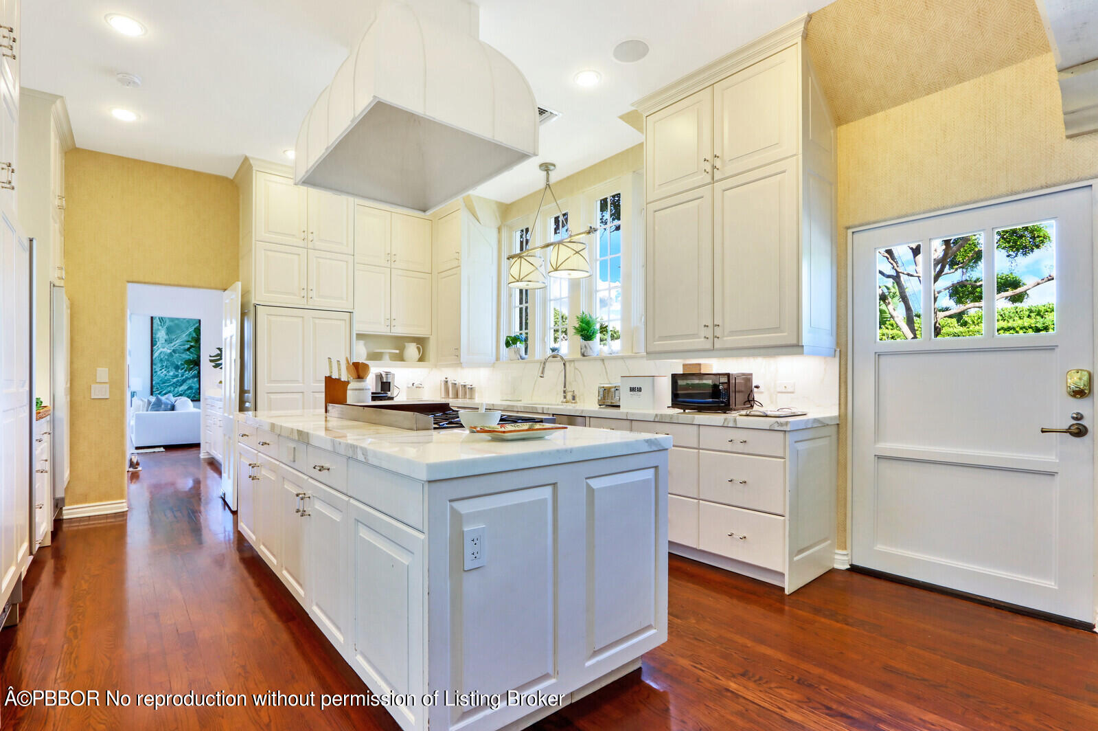 210 Via Del Mar Palm Beach, FL 33480 - Photo 28 of 85 a kitchen with kitchen island granite countertop a sink appliances cabinets and a counter top space