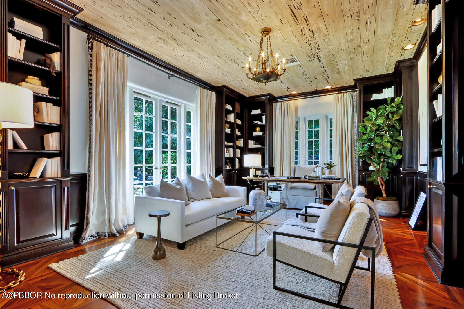 210 Via Del Mar Palm Beach, FL 33480 - Photo 31 of 85 a living room with patio furniture and a chandelier