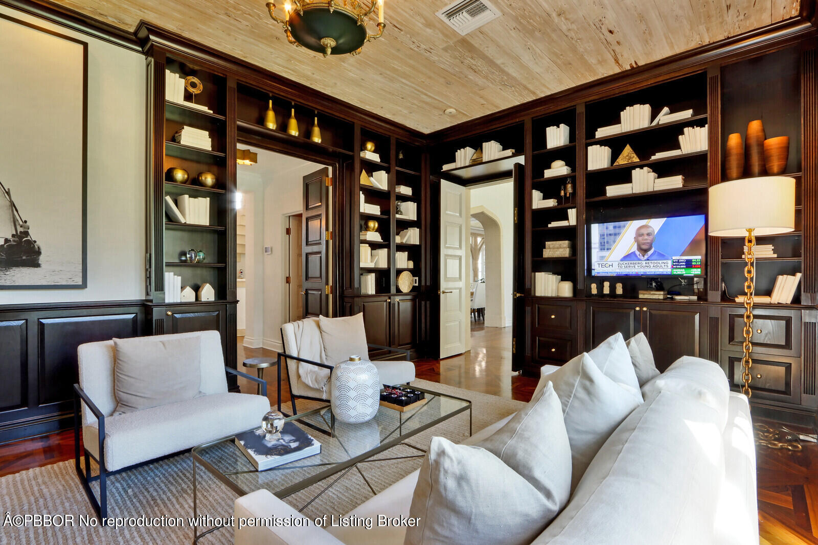 210 Via Del Mar Palm Beach, FL 33480 - Photo 32 of 85 a living room with furniture a ceiling fan and a floor to ceiling window