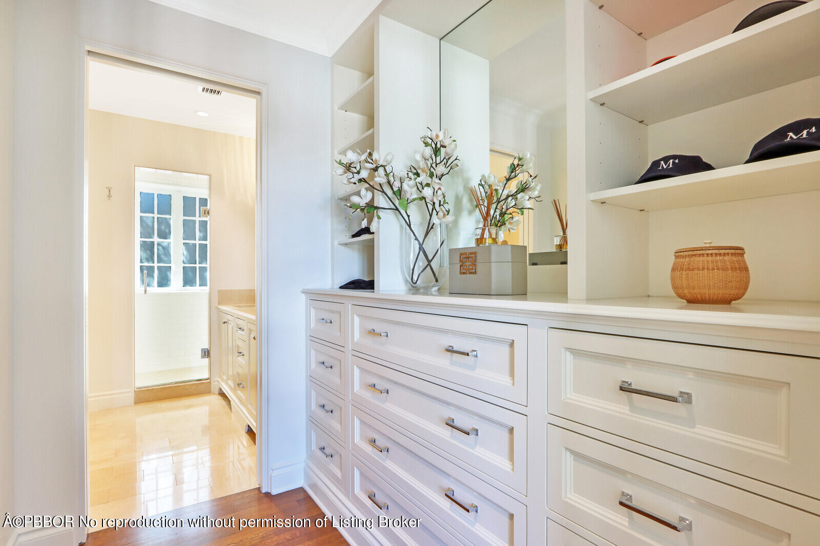 210 Via Del Mar Palm Beach, FL 33480 - Photo 37 of 85 a bathroom with a potted plant on the counter and mirror