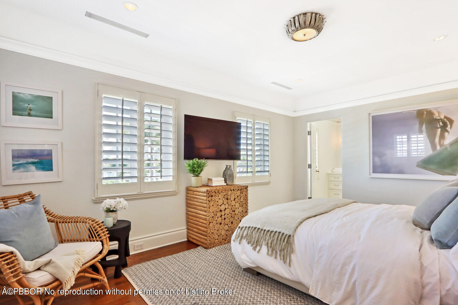 210 Via Del Mar Palm Beach, FL 33480 - Photo 49 of 85 a bedroom with a bed and a flat screen tv