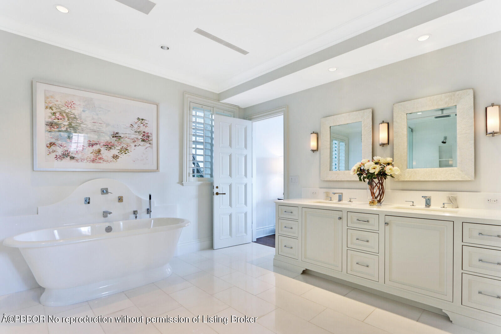210 Via Del Mar Palm Beach, FL 33480 - Photo 53 of 85 a spacious bathroom with a double vanity sink a mirror a bathtub and next to a window