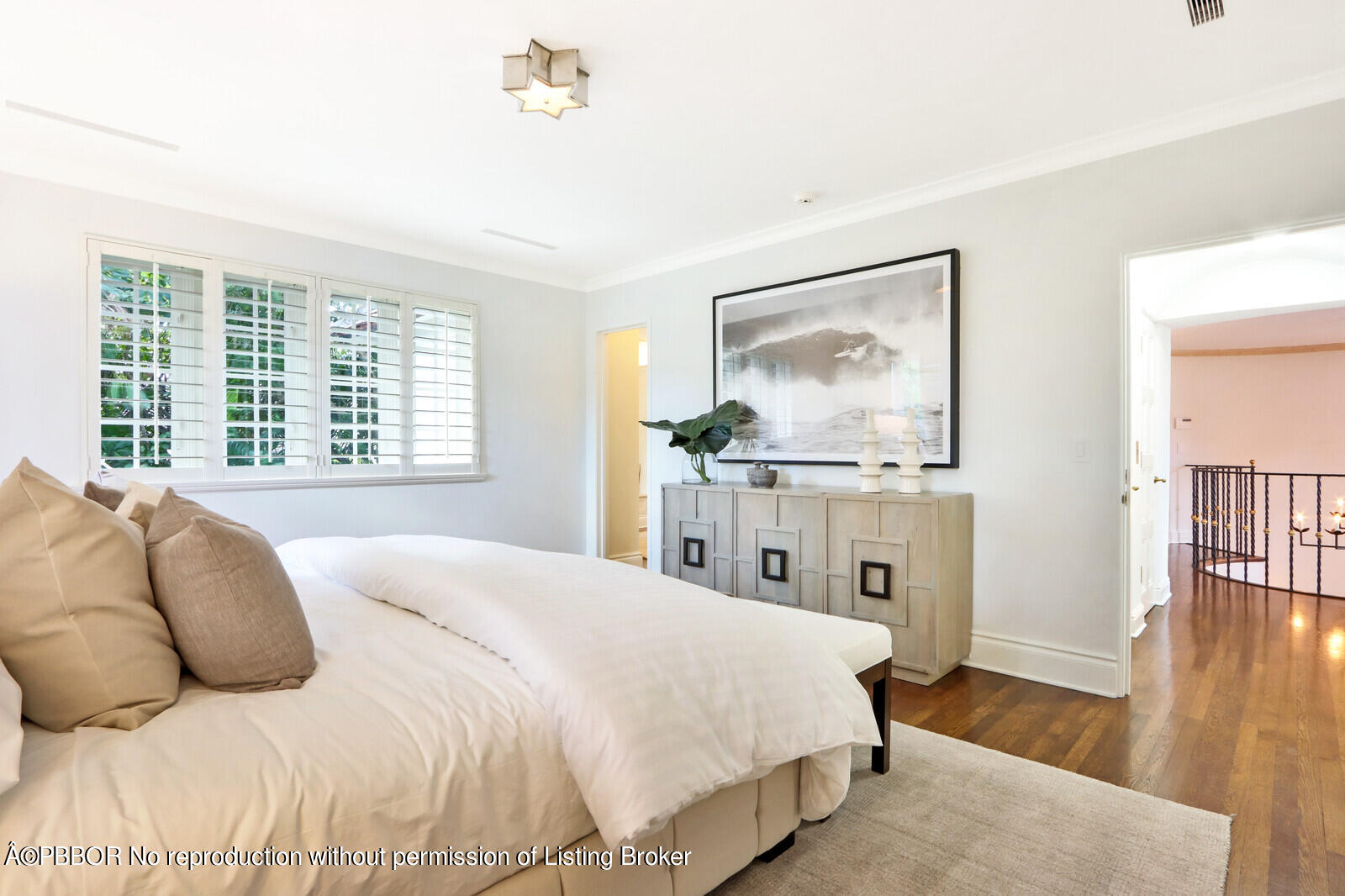 210 Via Del Mar Palm Beach, FL 33480 - Photo 58 of 85 a bedroom with a large bed and a window