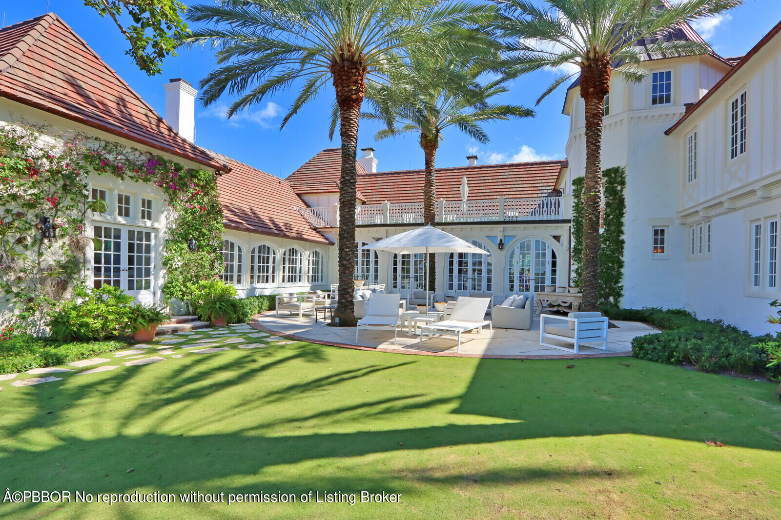 210 Via Del Mar Palm Beach, FL 33480 - Photo 65 of 85 a view of a house with swimming pool and a yard