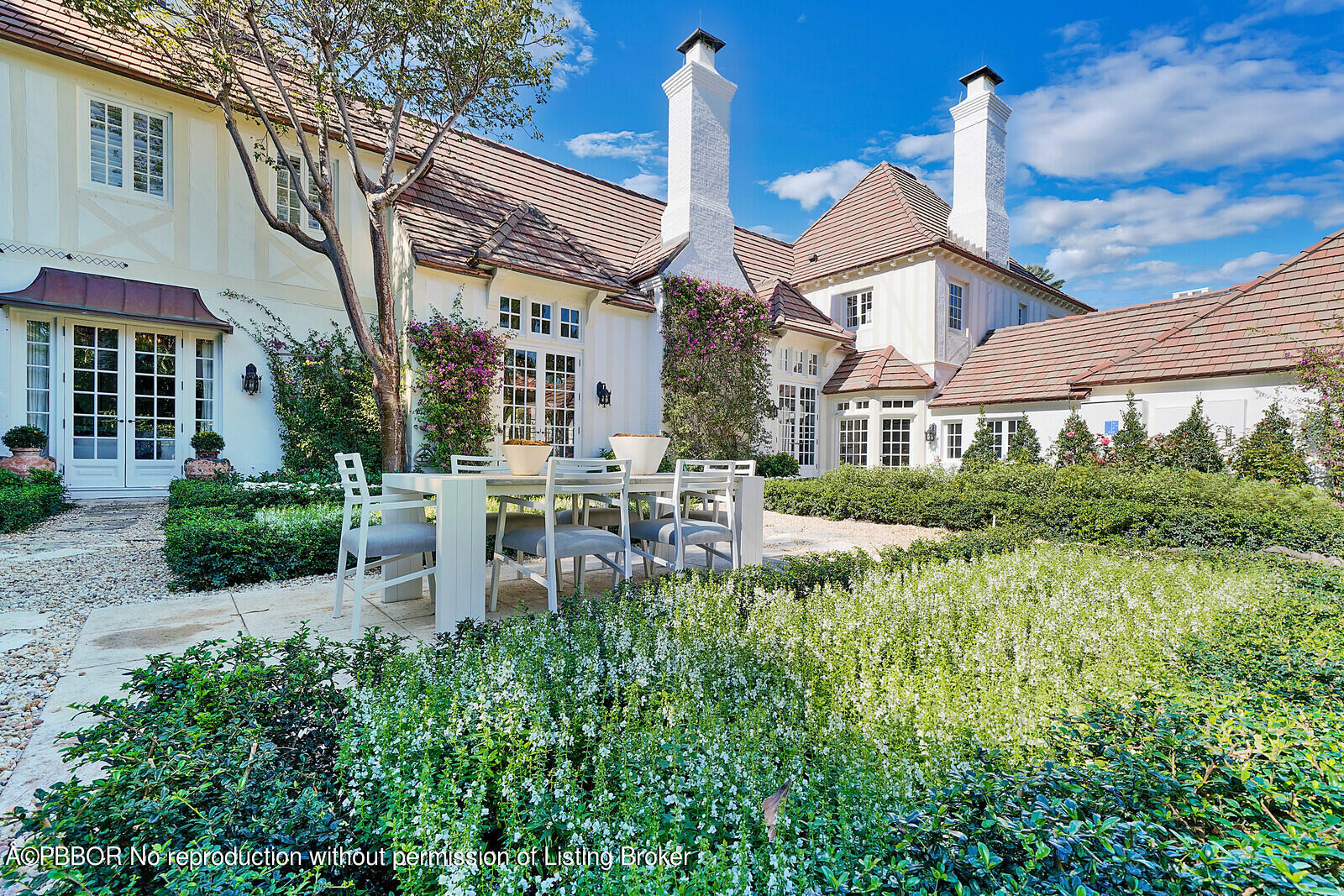 210 Via Del Mar Palm Beach, FL 33480 - Photo 68 of 85 a house view with a sitting space and garden view