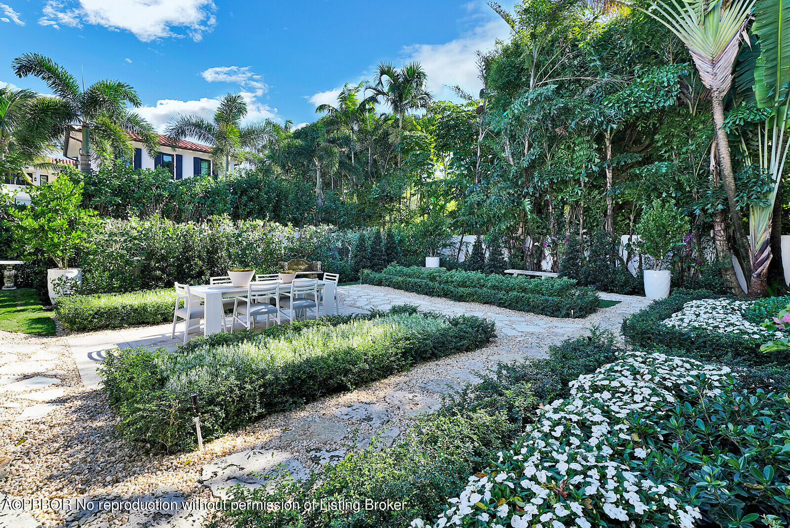 210 Via Del Mar Palm Beach, FL 33480 - Photo 70 of 85 a view of a garden with plants and large trees