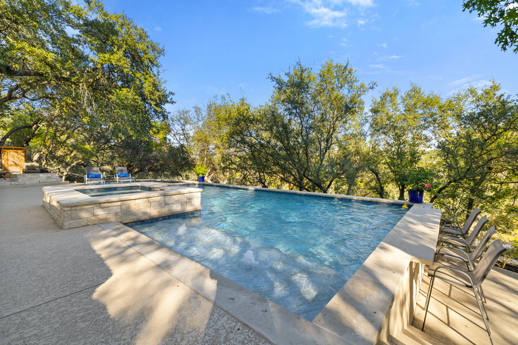 3507 Bee Creek Road Spicewood, TX 78669 - Photo 34 of 40 a view of a swimming pool with an outdoor space