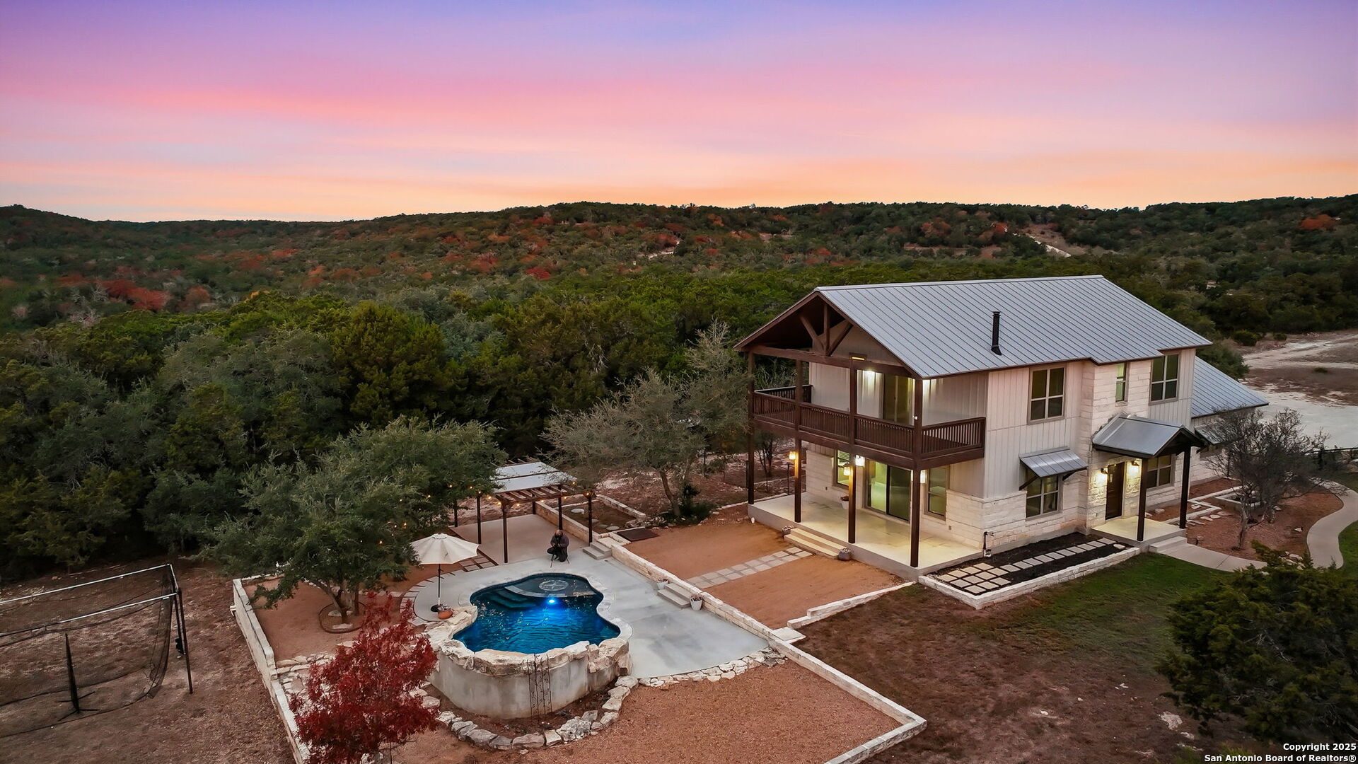 1275 Mystic Breeze Spring Branch, TX 78070 - Photo 1 of 50 an aerial view of a house with a yard and balcony