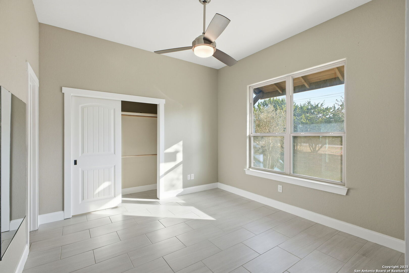1275 Mystic Breeze Spring Branch, TX 78070 - Photo 16 of 50 a view of an empty room with a window