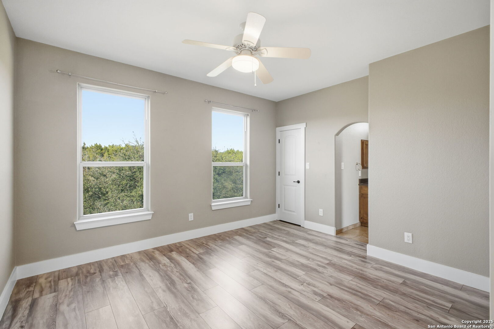 1275 Mystic Breeze Spring Branch, TX 78070 - Photo 28 of 50 a view of an empty room with a window and wooden floor
