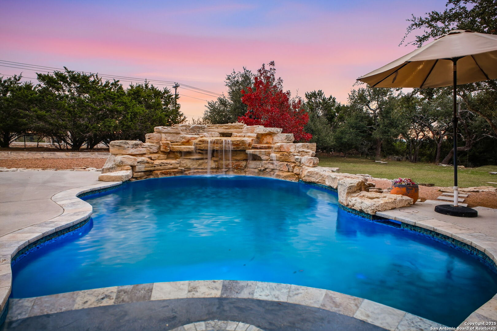 1275 Mystic Breeze Spring Branch, TX 78070 - Photo 47 of 50 a view of a swimming pool with an outdoor space and seating area