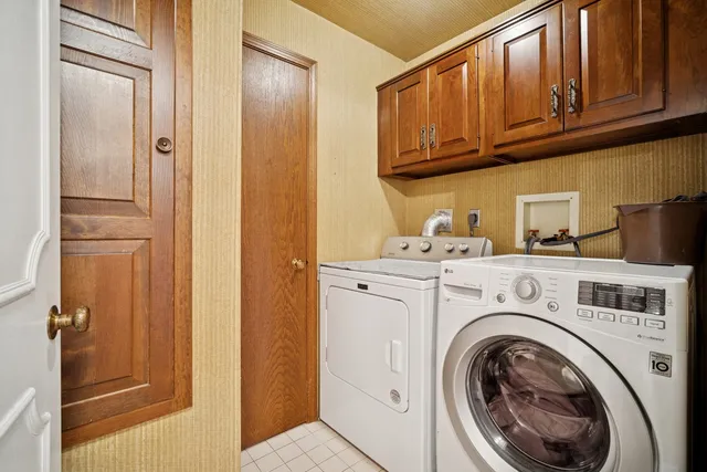a storage room with washer and dryer