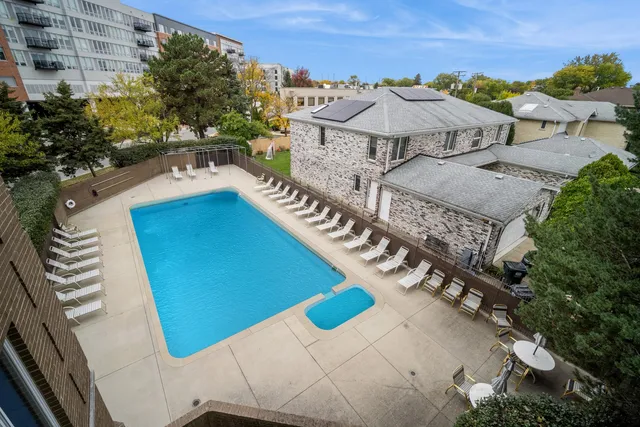a view of a house with outdoor space and sitting area