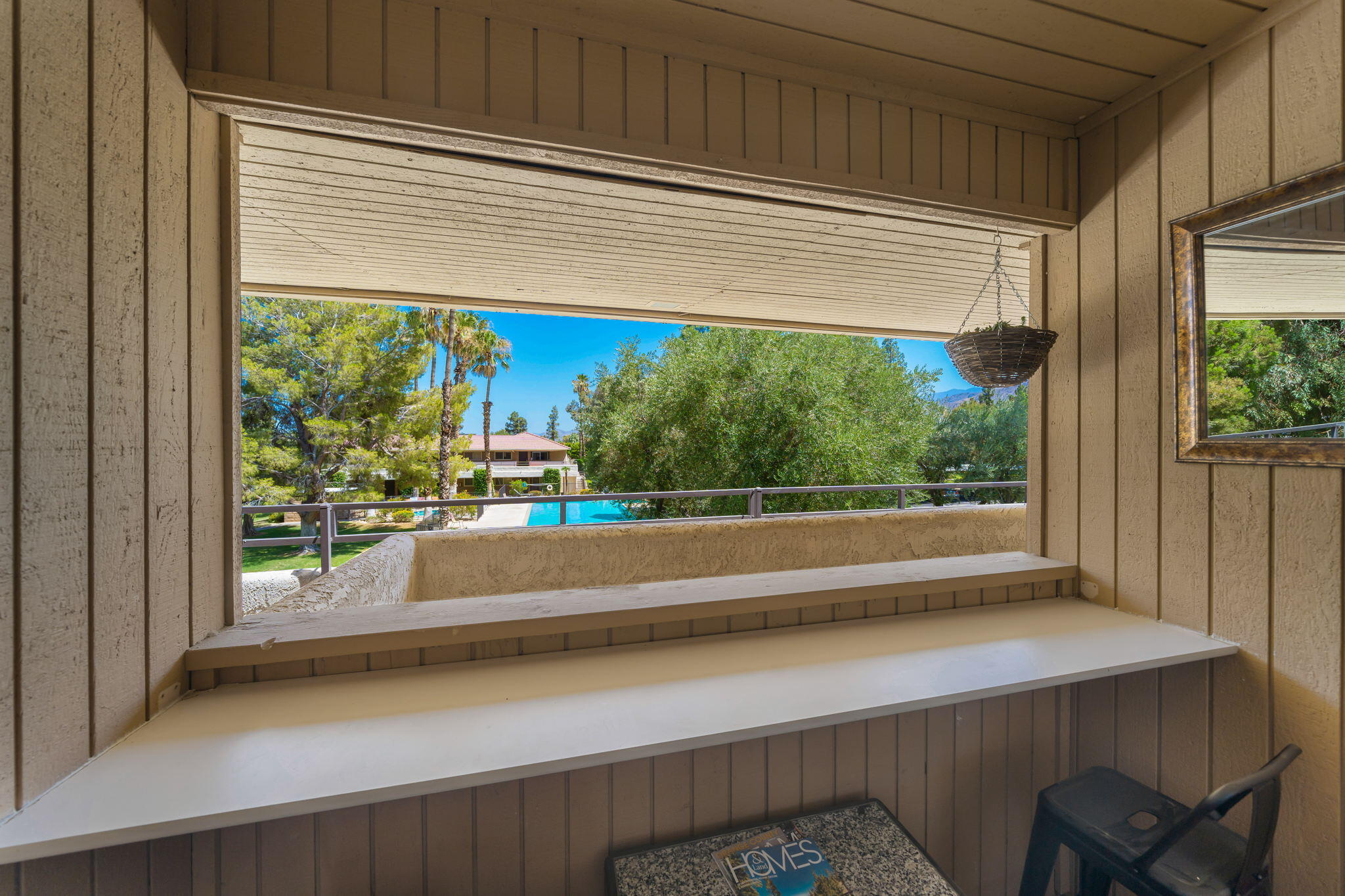 2860 North Los Felices Road, Unit 214 Palm Springs, CA 92262 - Photo 19 of 26 a view of a room that has a bed and a window