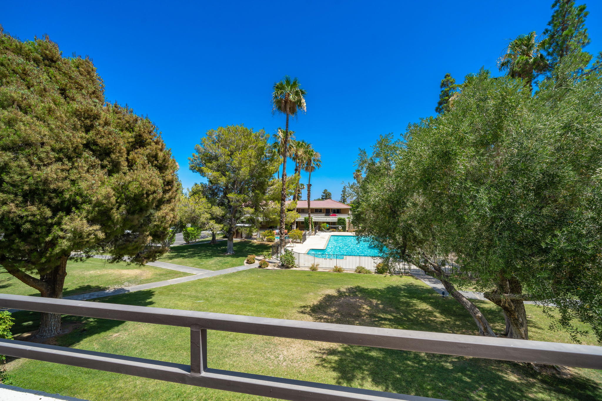 2860 North Los Felices Road, Unit 214 Palm Springs, CA 92262 - Photo 7 of 26 a view of a golf club with a park
